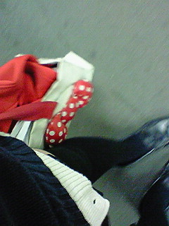 ���߂���